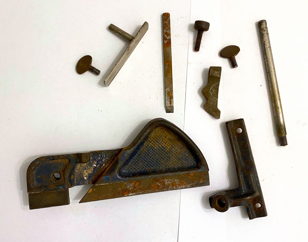 Disassembled Record 040 plough plane before having the rust removed