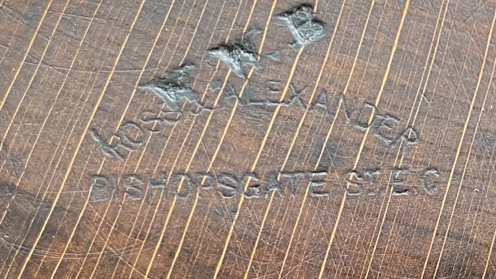 Makers mark on wooden plane showing Ross & Alexander