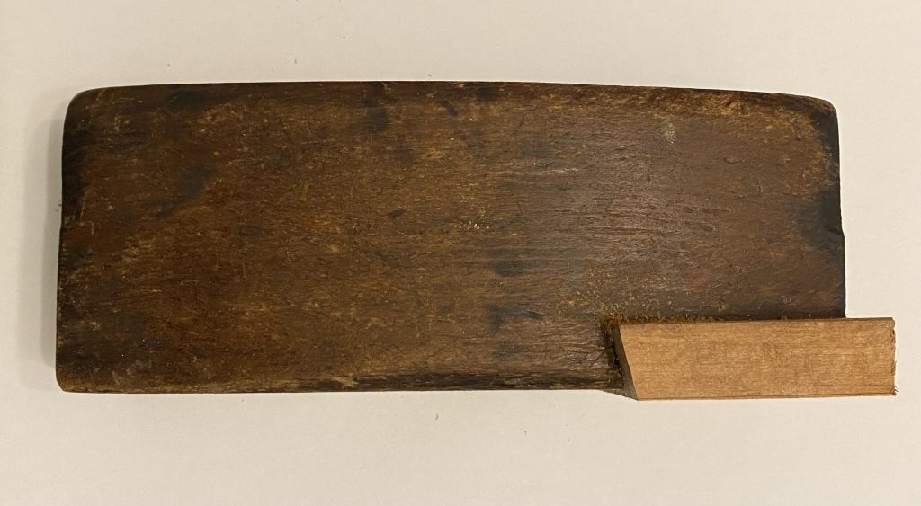 View of wooden plane mouth repair showing ware angle