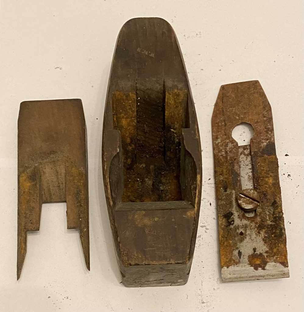 Wooden plane with iron and wedge taken out