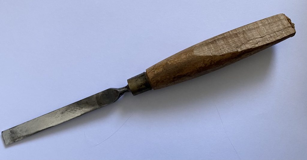 Chisel with split handle